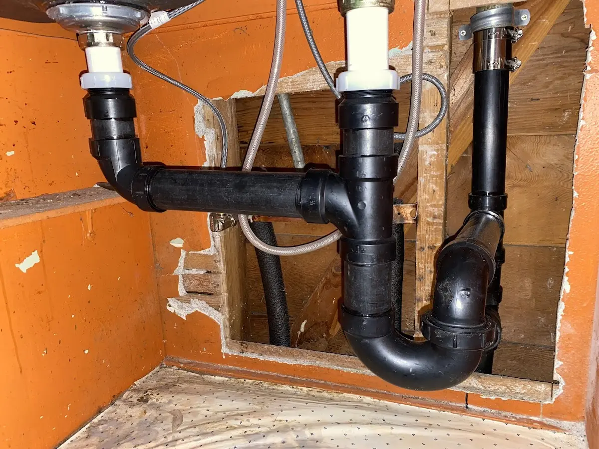 Professional Garbage Disposal Repair equipment and tools on the job in Windber